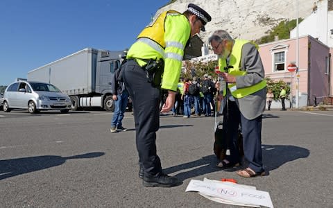 A 91-year-old Extinction Rebellion protestor John Lymes brought traffic to a halt by drinking his coffee in the road  - Credit: STEVE FINN PHOTOGRAPHY