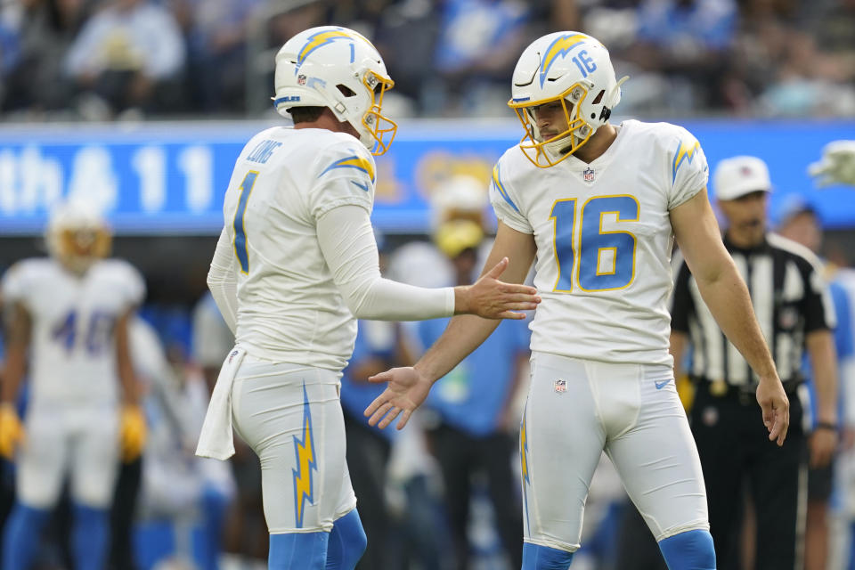 Los Angeles Chargers kicker Tristan Vizcaino right, celebrates with punter Ty Long after making a field goal during the second half of an NFL football game Sunday, Sept. 19, 2021, in Inglewood, Calif. (AP Photo/Ashley Landis)