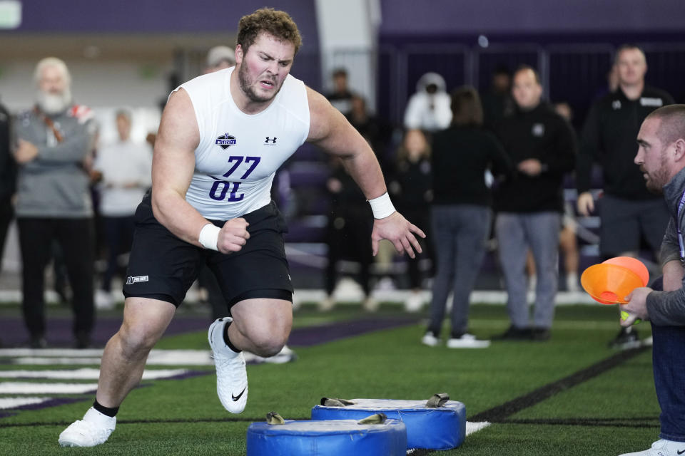 FILE - Northwestern offensive lineman Peter Skoronski participates in a position drill during Northwestern Pro Day for NFL football coaches and scouts, March 14, 2023, in Evanston, Ill. Skoronski might not even be the best player in a family where the football bloodlines run deep. (AP Photo/Nam Y. Huh, File)