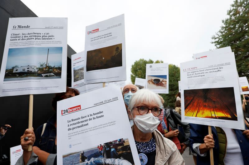 Supporters of activists gather at the District Court of West Lausanne