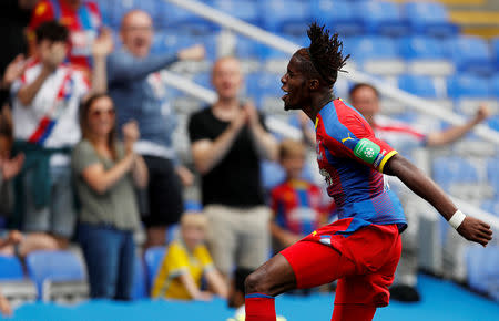 FILE PHOTO: Soccer Football - Pre Season Friendly - Reading v Crystal Palace - Madejski Stadium, Reading, Britain - July 28, 2018 Crystal Palace's Wilfried Zaha celebrates scoring their third goal Action Images via Reuters/John Sibley