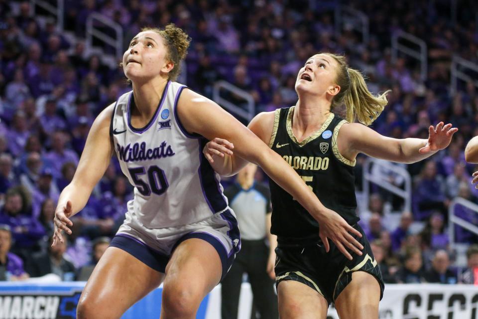 Kansas State center Ayoka Lee (50) battles Colorado's Kindyll Wetta (15) for rebounding positiong during last year's second-round NCAA Tournament game at Bramlage Coliseum.