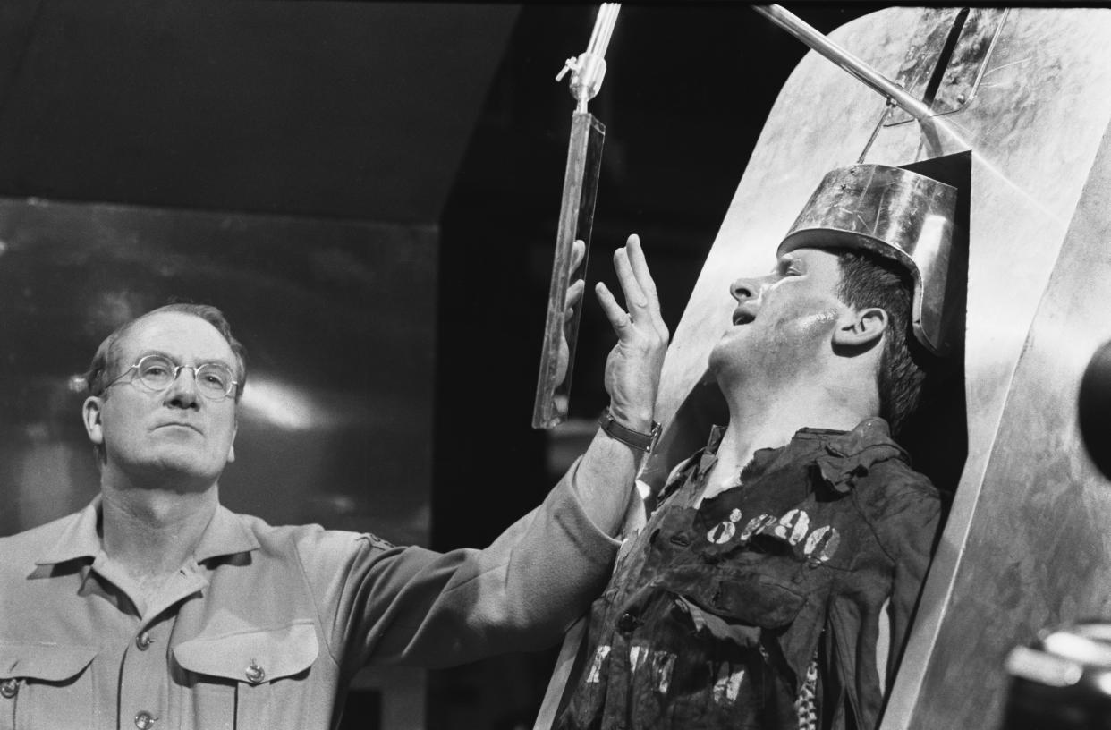 O'Brien (played by Joseph O'Conor) tortures the hapless Winston Smith (David Buck) in the BBC TV Theatre 625 production of George Orwell's classic novel '1984' entitled 'The World of George Orwell: 1984' on 29th June 1965. (Photo by Larry Ellis/Daily Express/Hulton Archive/Getty Images)