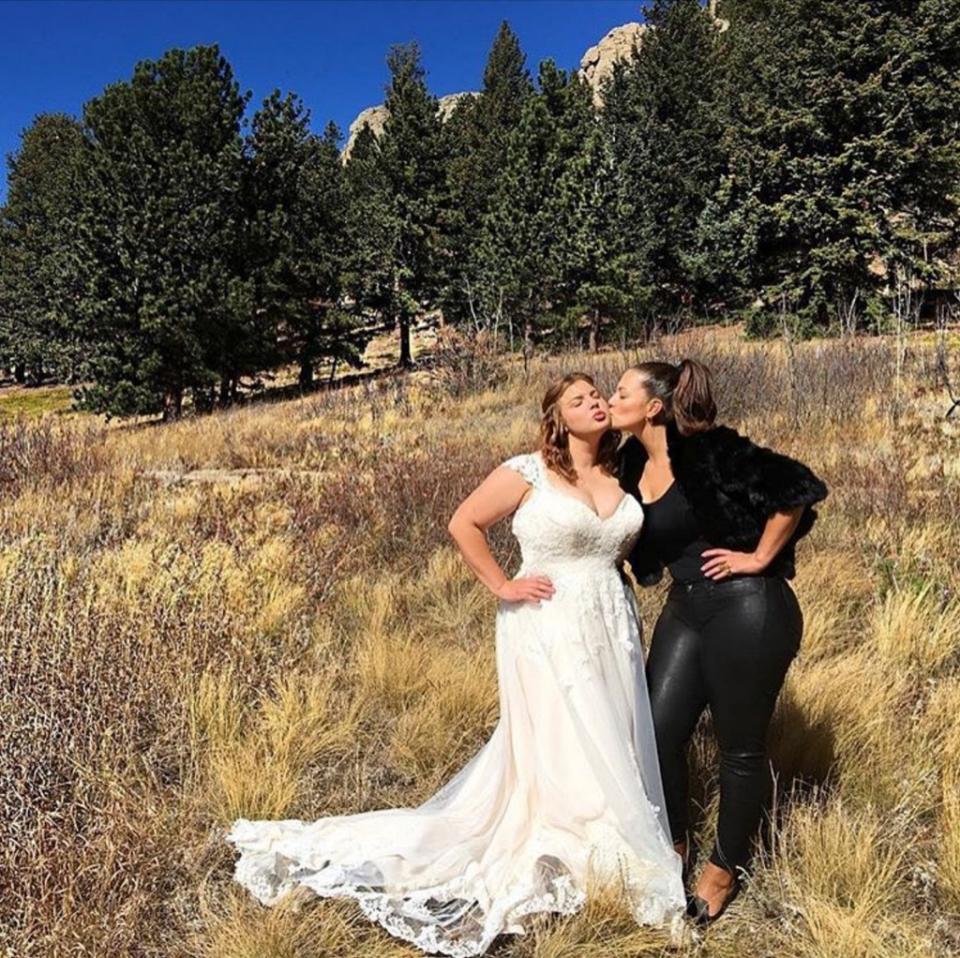 Ashley Graham is not your traditional role model — so it's no surprise that she bucked sartorial tradition at her sister's wedding. (Photo: Courtesy of Instagram/adriennelandau)