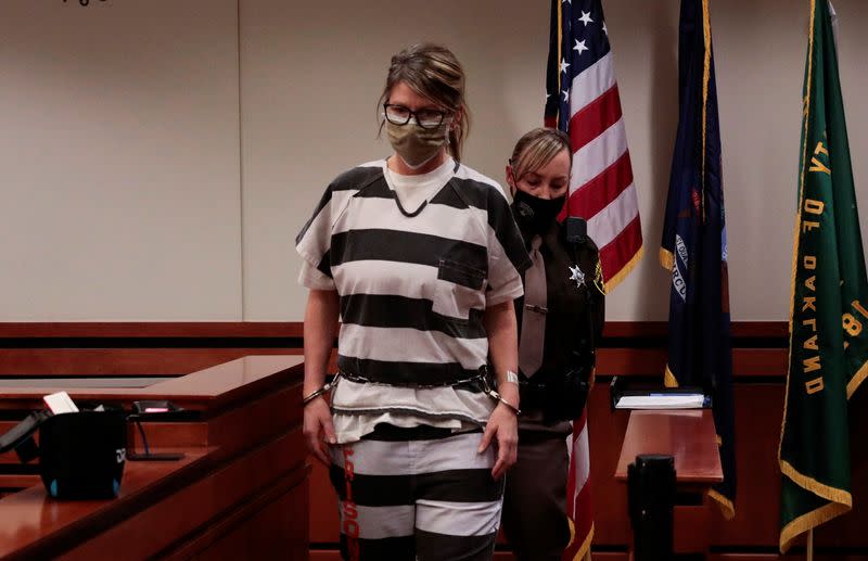 Jennifer Crumbley, the mother of accused Oxford High School gunman Ethan Crumbley, enters the court room during a court procedural hearing in Rochester Hills