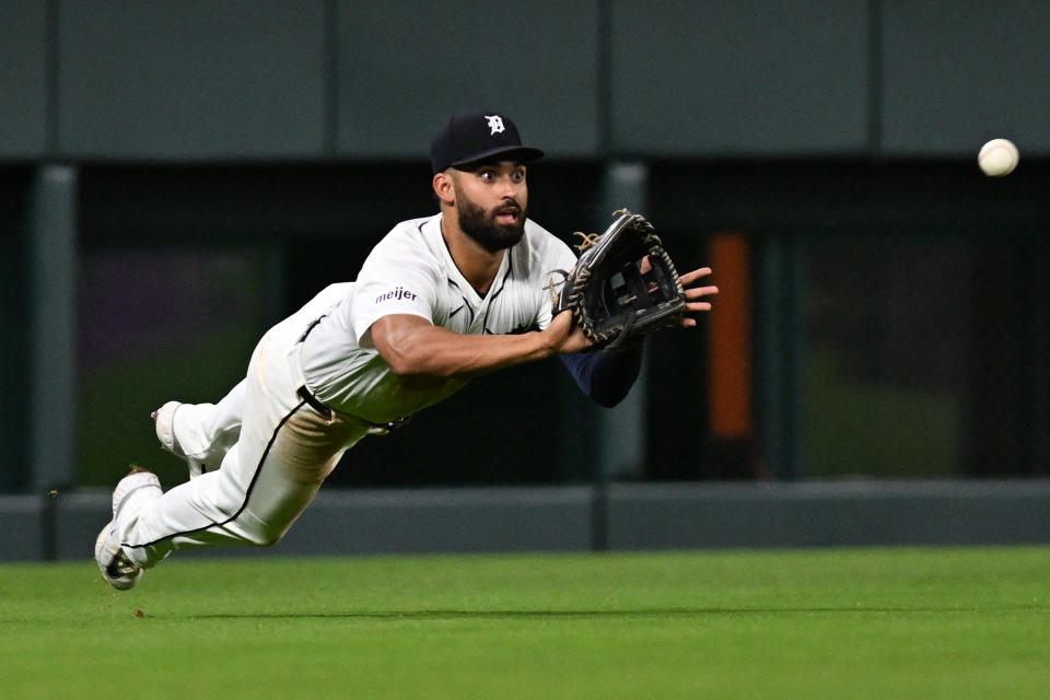 September 25, 2024; Detroit, Michigan, USA; Detroit Tigers left fielder Riley Greene (31) makes a diving catch against the Tampa Bay Rays in the bottom of the eighth inning at Comerica Park. Mandatory attribution: Lon Horwedel-Imagn Images