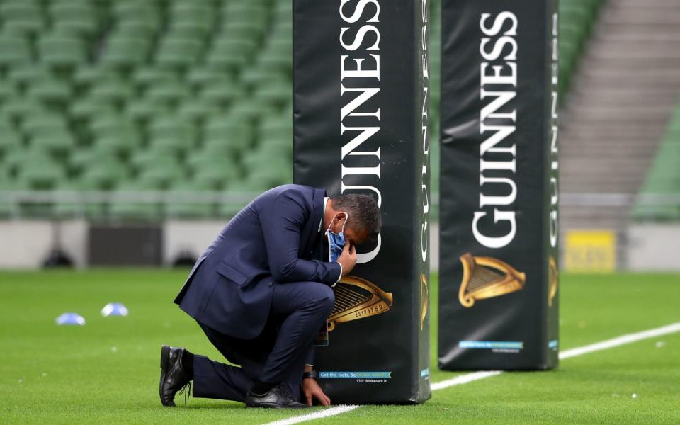 Italy head coach Franco Smith inspects the pitch before the 6 Nations match at the Aviva Stadium, Dublin. PA Photo. Picture date: Saturday October 24, 2020. - PA