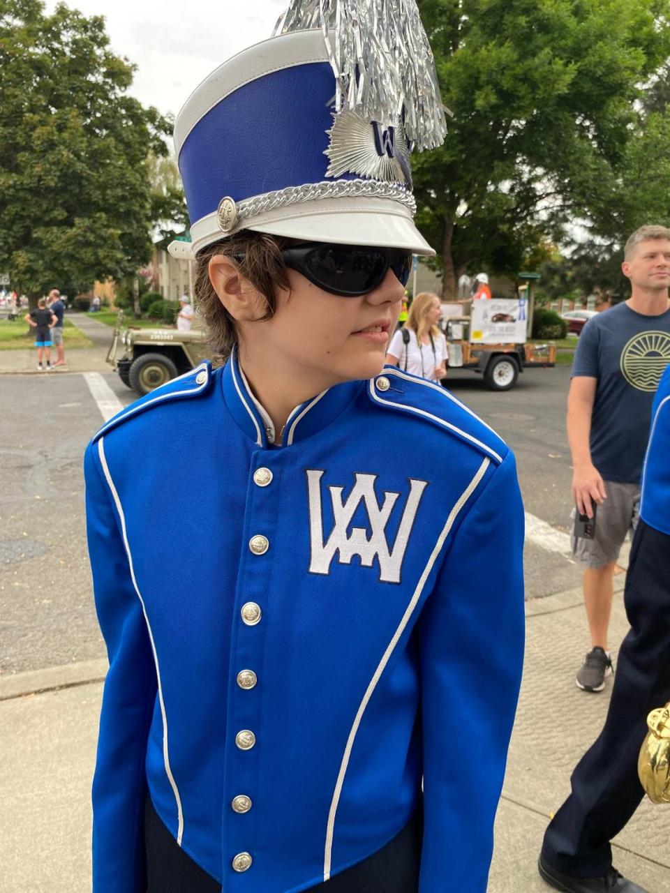 Aiden Moore-Van De Rostyne, 16, is part of the percussion section of a Walla Walla High School band. Experimental gene therapy has improved her vision.