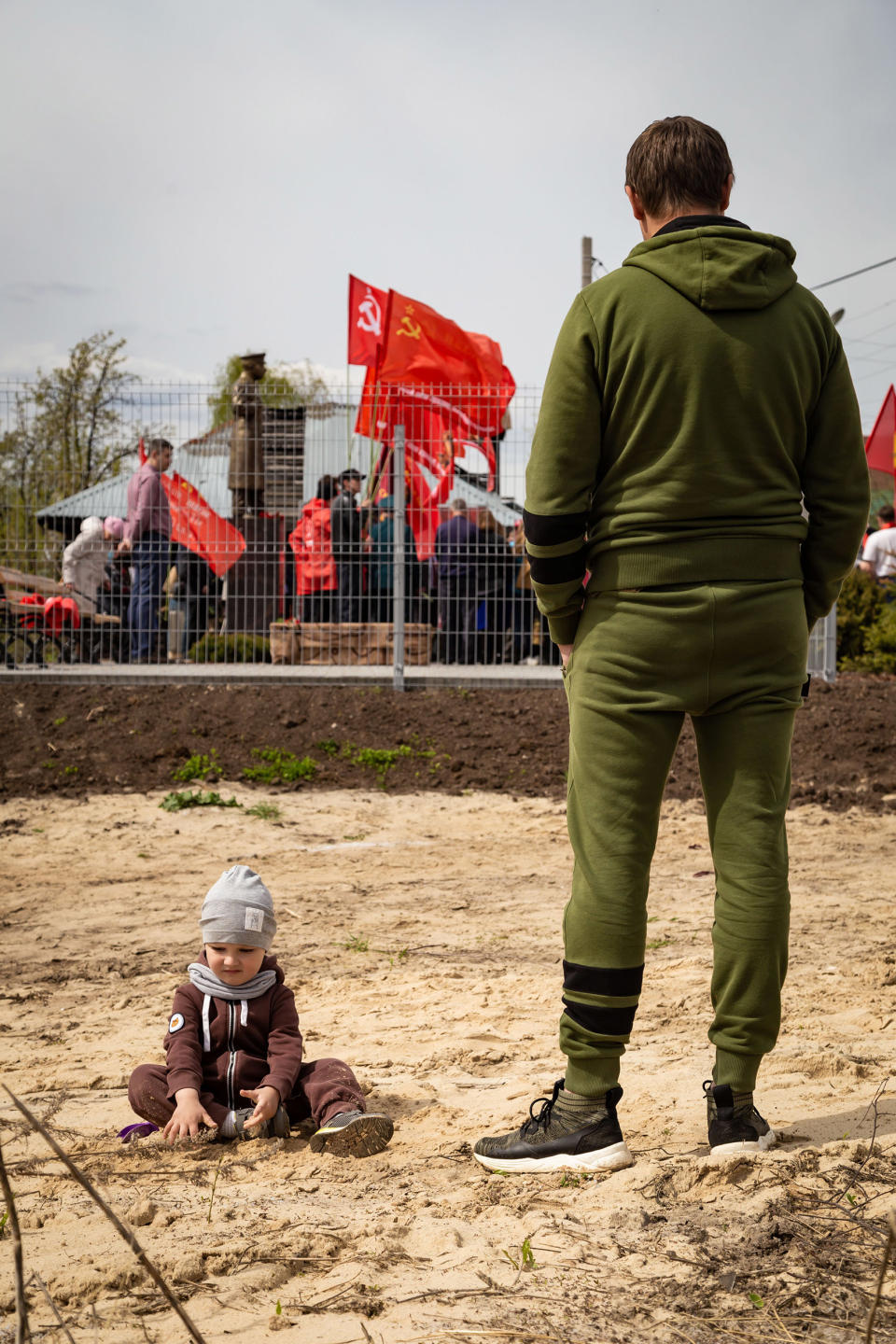 Image: People watch the laying the first stone in the foundations of the Stalin Center, Bor, Nizhny Novgorod (Anton Belousov / for NBC News)
