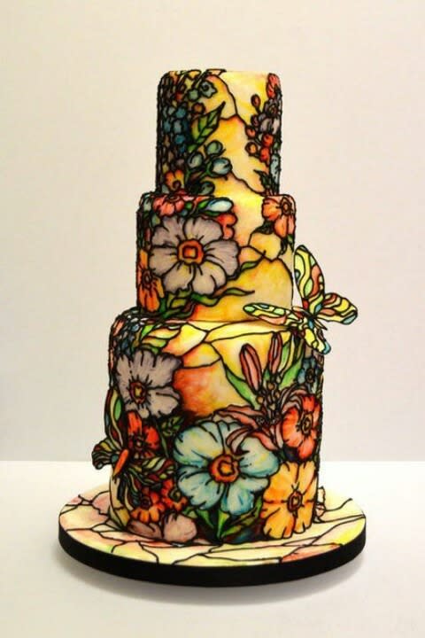 Painted with a stained glass effect, the person who decorated this cake has some serious talent. 