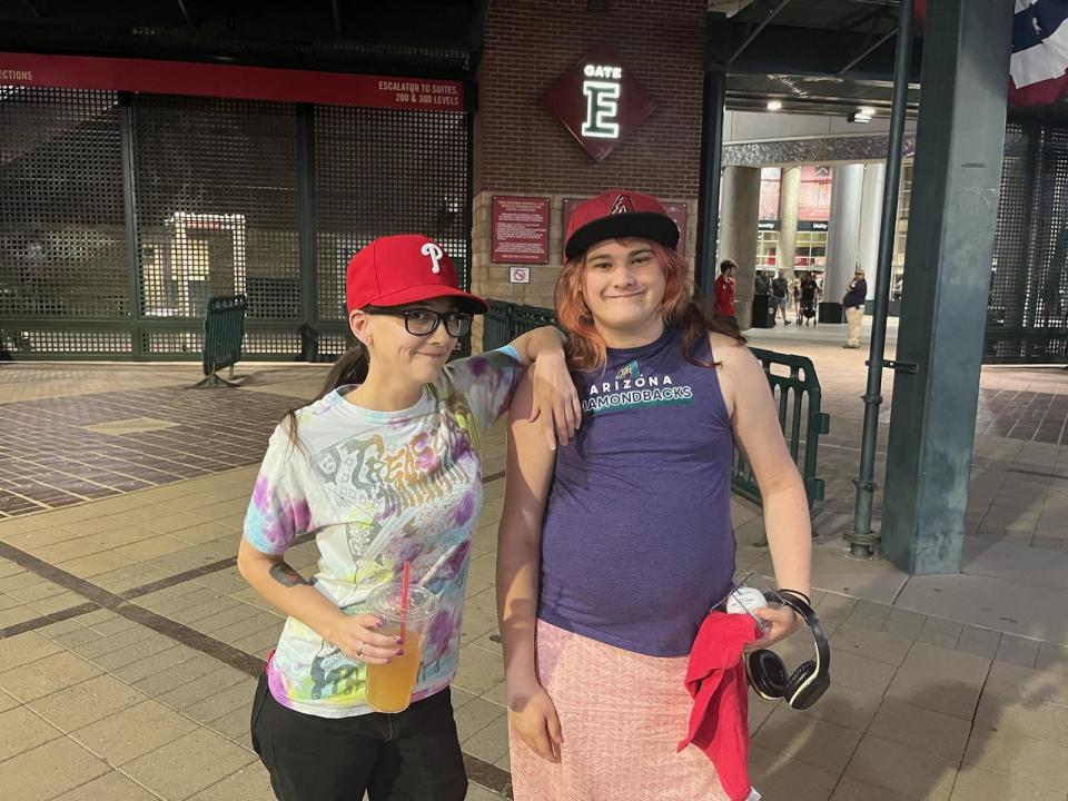 Emily Sangmeister, a lifelong Phillies fan, and her niece Ashley Robbins, who roots for the Diamondbacks, attend Game 4 at Chase Field in Phoenix on Oct. 20, 2023.