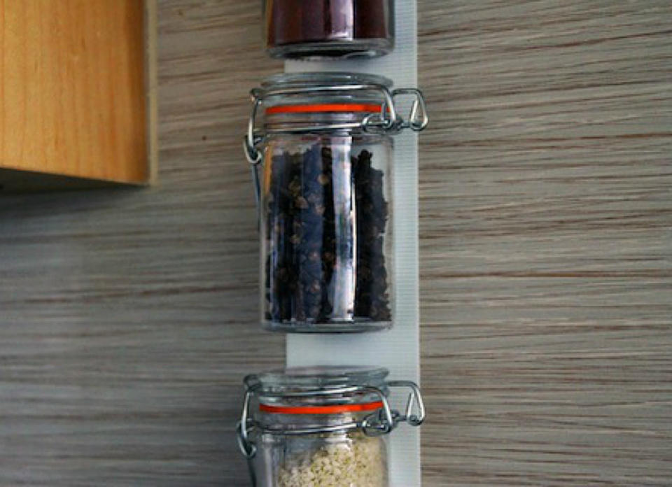 <body> <p>Variety is the spice of life—so why not change up your storage with a new behind-the-door spice rack? Assemble scrap wood, a wooden dowel, and a few screws into a lightweight shelf. Secure the rack to an interior cabinet door lined with decorative contact paper to store your <a rel="nofollow noopener" href=" http://www.bobvila.com/slideshow/10-instant-cures-for-any-kitchen-odor-50094?bv=yahoo" target="_blank" data-ylk="slk:aromatics;elm:context_link;itc:0;sec:content-canvas" class="link ">aromatics</a> in style.</p> <p><strong>Related: <a rel="nofollow noopener" href=" http://www.bobvila.com/slideshow/10-clever-diy-ways-to-store-kitchen-spices-48265#.V-VA4ZMrKRs?bv=yahoo" target="_blank" data-ylk="slk:10 Clever DIY Ways to Store Kitchen Spices;elm:context_link;itc:0;sec:content-canvas" class="link ">10 Clever DIY Ways to Store Kitchen Spices</a> </strong> </p> </body>