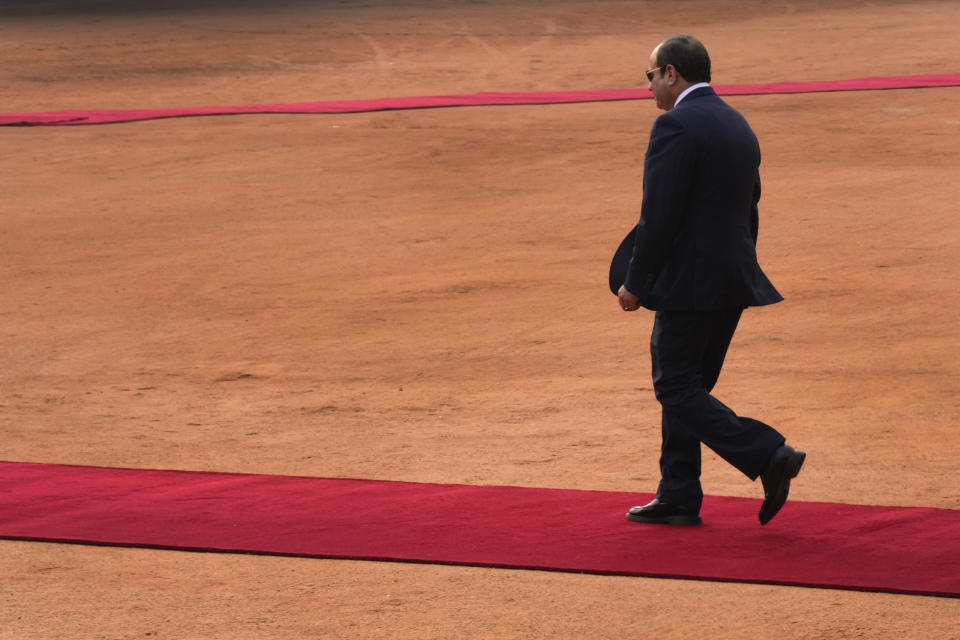 Egyptian President Abdel Fattah El-Sisi returns after inspecting a joint military guard of honour during his ceremonial reception at the Indian presidential palace, in New Delhi, India, Wednesday, Jan. 25, 2023. El-Sisi will be the Chief Guest on the country's annual Republic Day parade on Thursday. (AP Photo/Manish Swarup)