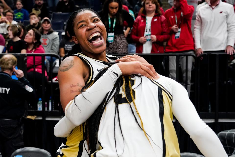 MINNEAPOLIS, MN - MARCH 02: Jeanae Terry #10 and Jayla Smith #3 of the Purdue Boilermakers celebrate their victory against the Wisconsin Badgers after the game in the second round of the Big Ten Women's Basketball Tournament at Target Center on March 2, 2023 in Minneapolis, Minnesota. The Boilermakers defeated the Badgers 57-55. (Photo by David Berding/Getty Images)