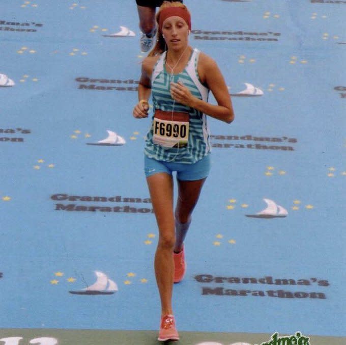 Walter wearing a wig while running her first marathon in 2012. (Photo courtesy of Lindsay Walter)