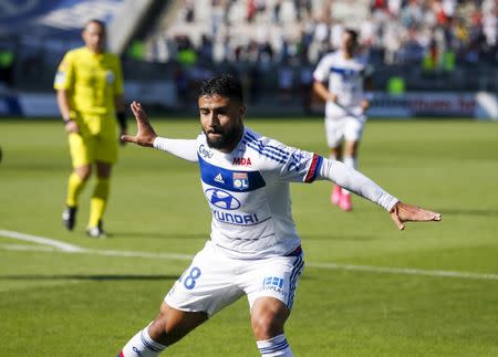 Olympique Lyon's Nabil Fekir (C) reacts after scoring against Rennes during their French Ligue 1 soccer match at the Gerland stadium in Lyon, France, August 22, 2015. REUTERS/Robert Pratta