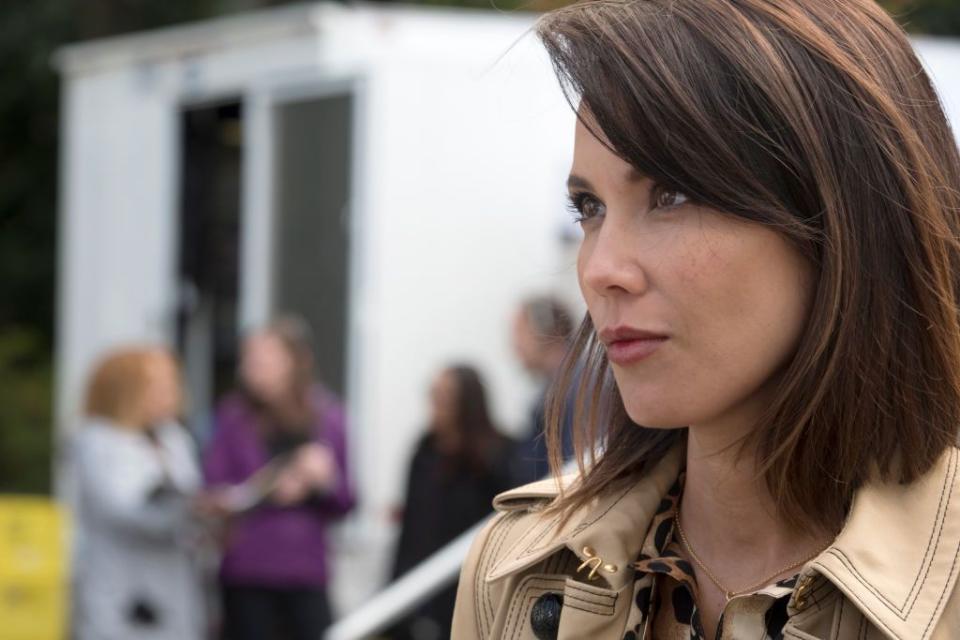 Lexa Doig as Paige Lassiter