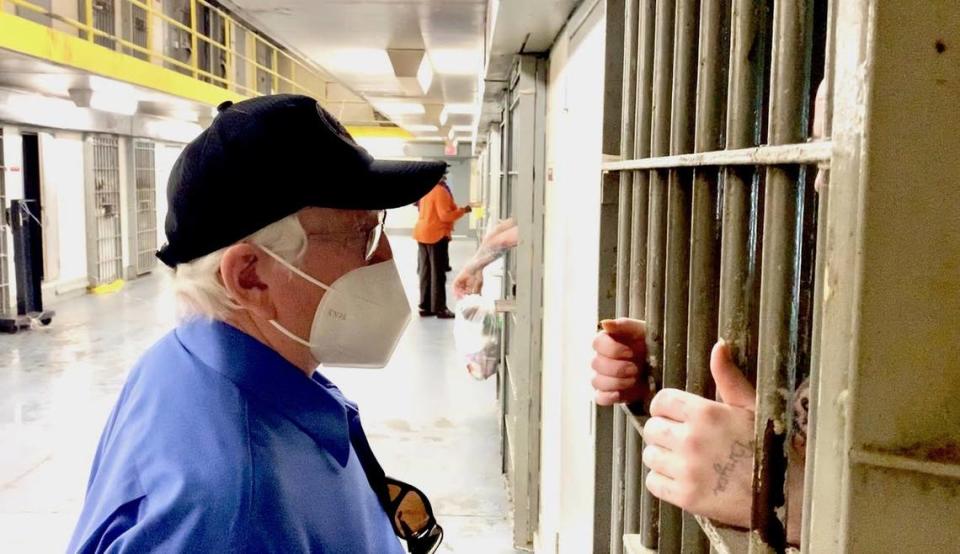 Mississippi Corrections Commissioner Burl Cain talks with an inmate at the State Penitentiary at Parchman. Cain stays in contact with state inmates. Each week, Cain receives hundreds of letters from inmates, and he tries to answer them all.