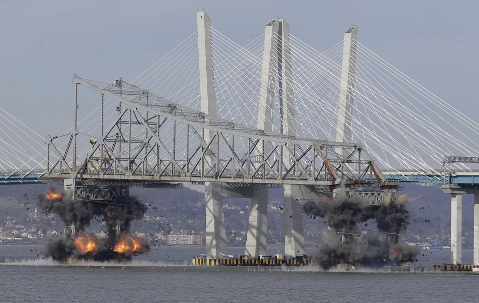 A section of the old Tappan Zee Bridge is brought down with explosives in this view from Tarrytown, N.Y., Tuesday, Jan. 15, 2019. (AP Photo/Seth Wenig)