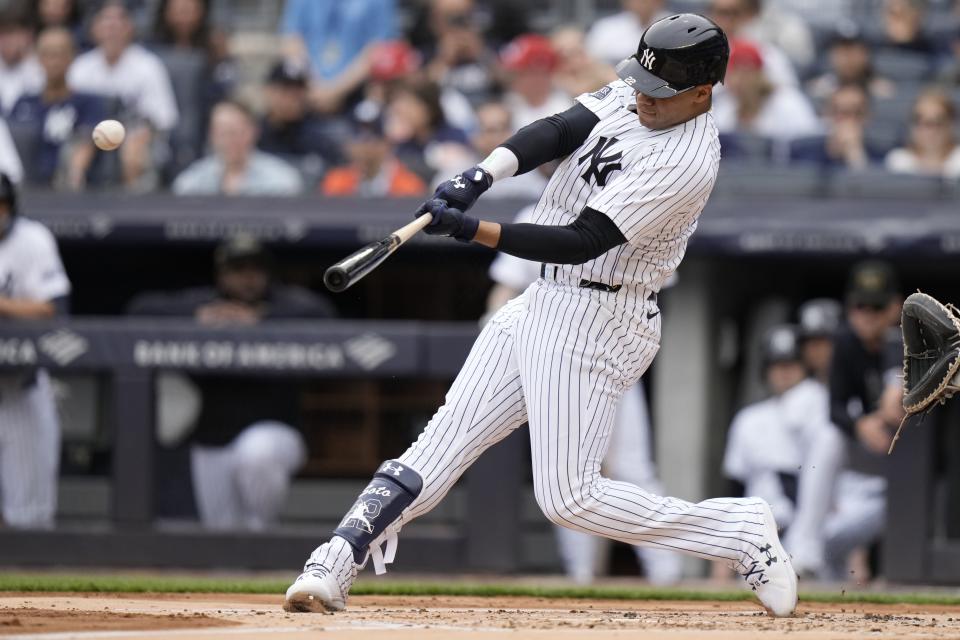 New York Yankees' Juan Soto hits a home run during the first inning of a baseball game against the Chicago White Sox, Saturday, May 18, 2024, in New York. (AP Photo/Frank Franklin II)