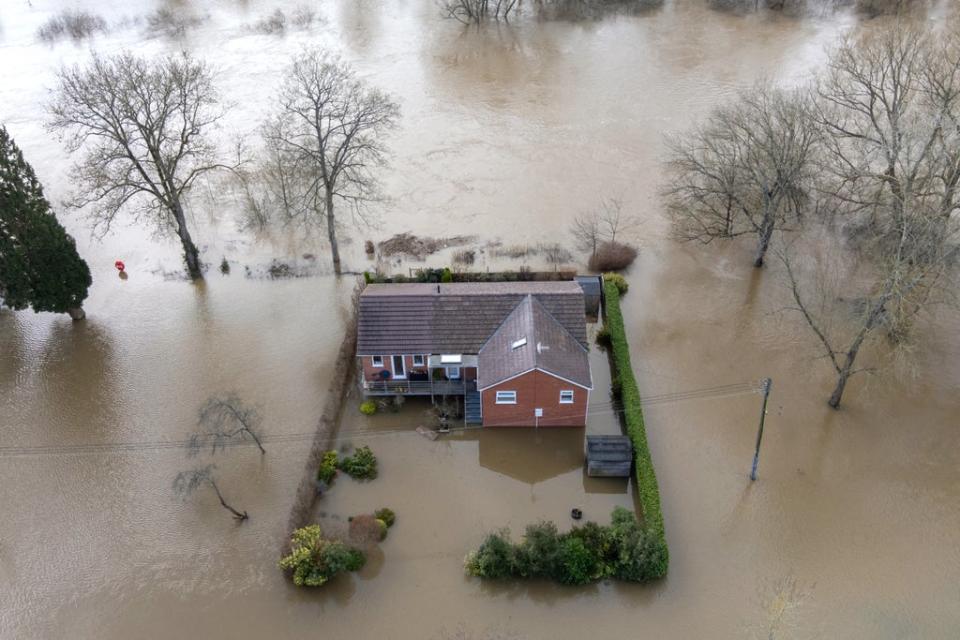 A property surrounded by floodwater after the River Severn burst its banks at Bewdley in Worcestershire following high rainfall from Storm Franklin in February 2022 (Joe Giddens/PA) (PA Wire)