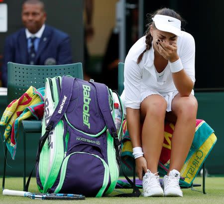 Britain Tennis - Wimbledon - All England Lawn Tennis & Croquet Club, Wimbledon, England - 30/6/16 Croatia's Ana Konjuh cries after sustaining an injury in her match against Poland's Agnieszka Radwanska REUTERS/Paul Childs