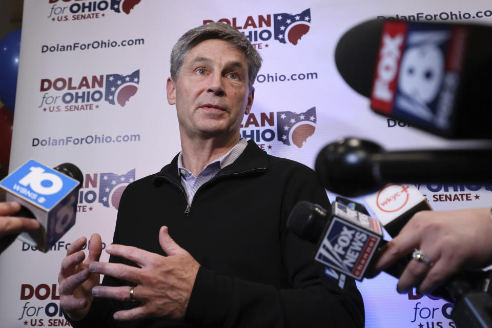 Ohio state Sen. Matt Dolan, Republican candidate for U.S. Senate, finishes answering reporters' questions after conceding to Republican Bernie Moreno during a primary election watch party in Independence, Ohio, Tuesday, March 19, 2024. (AP Photo/Paul Vernon)