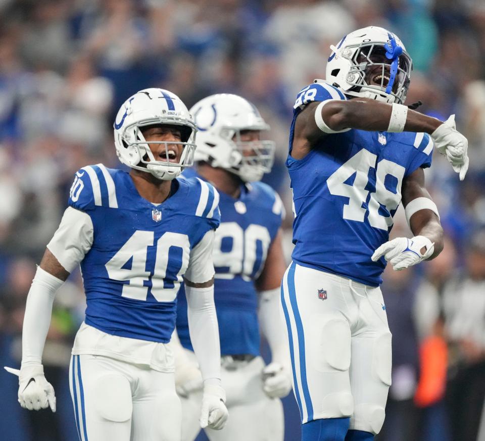 Indianapolis Colts cornerback Jaylon Jones (40) and Indianapolis Colts safety Ronnie Harrison Jr. (48) celebrate a play Sunday, Dec. 31, 2023, during a game against the Las Vegas Raiders at Lucas Oil Stadium in Indianapolis.