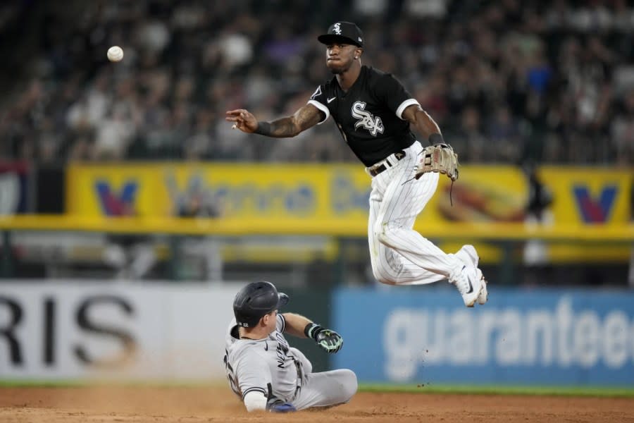 Chicago White Sox shortstop Tim Anderson forces New York Yankees’ Harrison Bader out at second and gets Kyle Higashioka at first to turn the double play during the seventh inning of a baseball game, Wednesday, Aug. 9, 2023, in Chicago. (AP Photo/Charles Rex Arbogast)