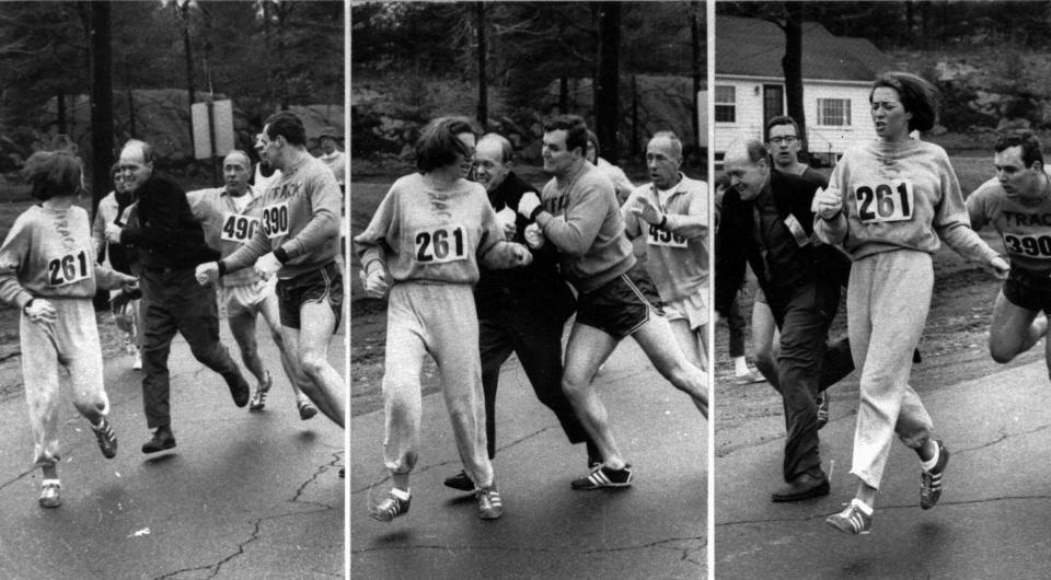 Kathrine Switzer found herself about to be thrown out of the normally all-male Boston Marathon when a husky companion, Thomas Miller of Syracuse, threw a block that tossed race official Jock Semple out of the running instead, April 19, 1967.