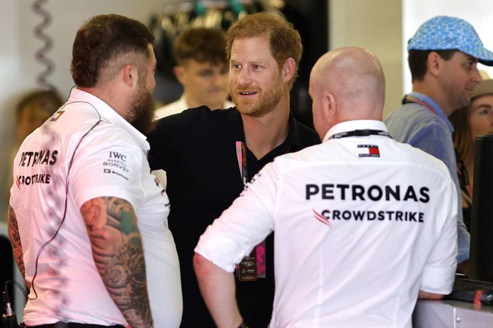 <p>Chris Graythen/Getty</p> Prince Harry at the U.S. Grand Prix in Austin, Texas