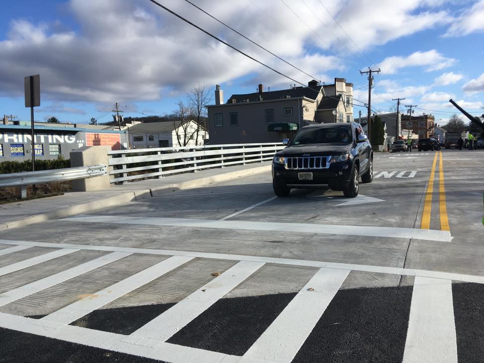 A car crosses the reopened East Blackwell Street Bridge in Dover on Wednesday, Nov. 18, completing a $1.85 million project that began in January.