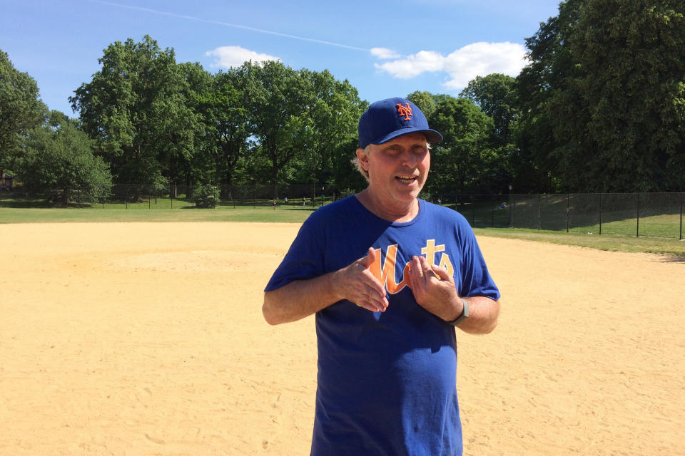 New York Mets fan Todd Montgomery talks Monday, June 15, 2020, in New York about how the 2020 MLB season would count, no matter how few games the teams played. MLB players and owners are currently caught in a bitter dispute over how to start amid the coronavirus pandemic. Both sides occasionally mention fans, talking about doing right by them. (AP Photo/Ben Walker)