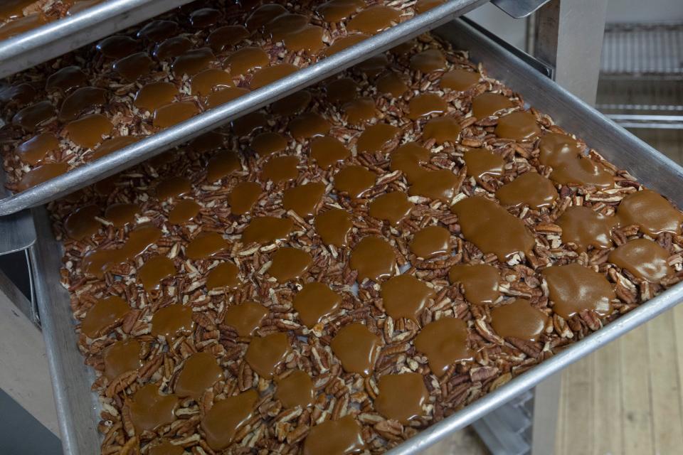Chocolate turtles in the process of being made at Criterion Chocolates, a nearly century-old, third-generation purveyor of premier chocolates based in Eatontown. They sell a variety of chocolate, candy apples and taffy.