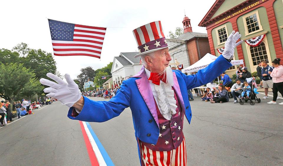 George Ford, aka Uncle Sam, leads the 2021 Fourth of July parade through Hingham Square.
