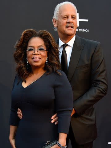 <p>Paul R. Giunta/Getty</p> prah Winfrey and Stedman Graham attend Tyler Perry Studios grand opening gala on October 05, 2019 in Atlanta, Georgia.