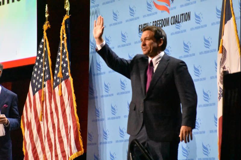 Florida Gov. Ron DeSantis waves to the crowd at the Iowa Faith and Freedom Coalition's 23rd annual fall gala at the Iowa Events Center on Saturday in Des Moines, Iowa. Photo by Joe Fisher/UPI