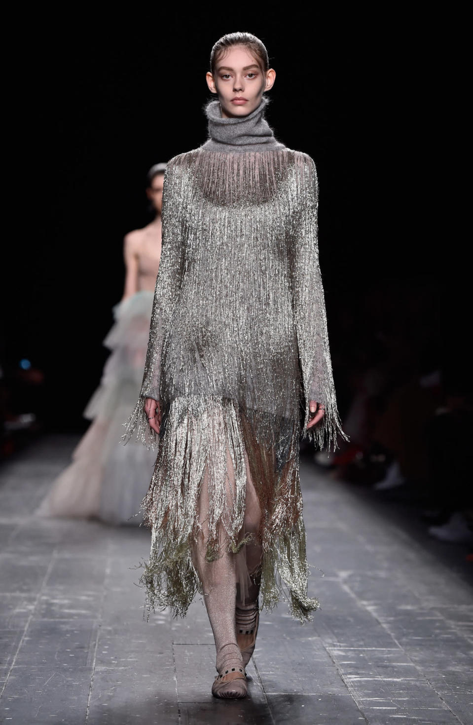 Yes another example of a dreamy dress layered over knitwear. 