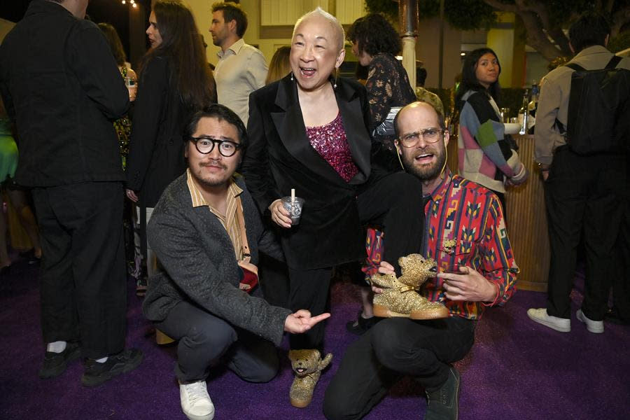 (Left to Right) Daniel Kwan, Lori Tan Chinn and Daniel Scheinert bring both a zany vibe and wacky shoes to the “Joy Ride” Los Angeles premiere at the Regency Village Theatre in Westwood. (Araya Doheny/Getty Images for Lionsgate)