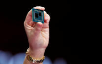 Lisa Su, president and CEO of AMD, holds up a 3rd generation Ryzen desktop processor during a keynote address at the 2019 CES in Las Vegas, Nevada, U.S., January 9, 2019. REUTERS/Steve Marcus