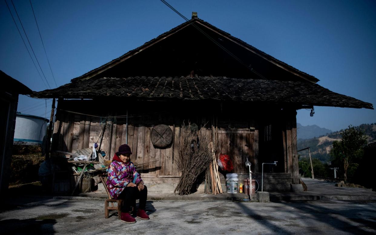 China's claims to have eradicated poverty ring hollow  - NOEL CELIS/AFP via Getty Images