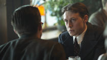 This image released by Netflix shows George MacKay as Hugh Legat, left, and Jannis Niewohner as Paul Hartman in a scene from "Munich: The Edge of War." (Frederic Batier/Netflix via AP)