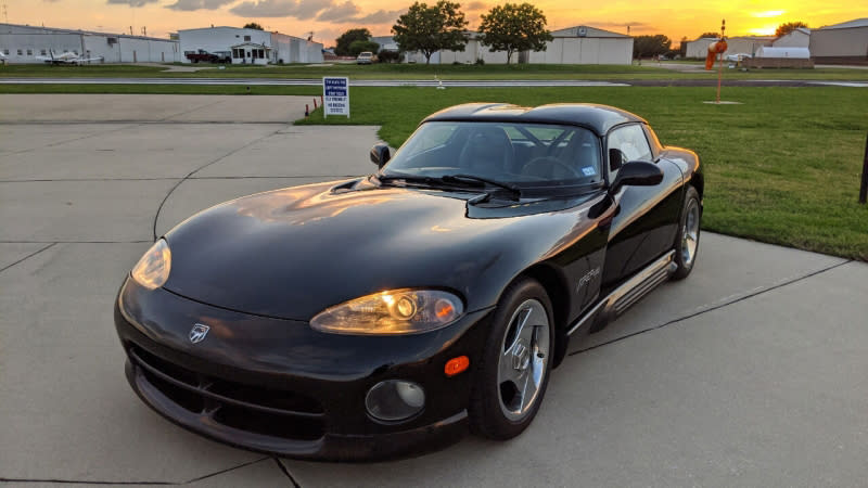 <p>Somebody had to do it, right? I know, <a href="https://www.autoblog.com/cars-for-sale-detail--7604904425589642672-Dodge-Viper-1995" data-ylk="slk:a 1995 Dodge Viper R/T 10;elm:context_link;itc:0;sec:content-canvas" class="link ">a 1995 Dodge Viper R/T 10</a> is not the most desirable of Vipers out there, but it’s still a Viper. And really, the V10 monster needs no more explanation.</p> <p>You’ve likely given it the passing thought, or laughed about it in the past. But acting on the childish urge to buy a Viper is a lot tougher than thinking about. Hopefully the knowledge that a Viper is the same price as the average new car should be the push over the edge you needed. When your coworkers question your sanity, just point at their base Ford Explorer and tell them that you two spent the same amount of money. See? The Viper is a responsible purchase.</p> <p>Accept the utterly horrendous ergonomics and lack of any amenities. There’s a V10 under the hood, and that’s what matters. As an added bonus, you’ll even be getting better fuel economy (11/20/14 mpg) than the folks who run out and buy a <a href="https://www.autoblog.com/2020/10/23/ram-1500-trx-hellcat-fuel-economy/" data-ylk="slk:Ram 1500 TRX;elm:context_link;itc:0;sec:content-canvas" class="link ">Ram 1500 TRX</a>. Checkmate? <strong>— Road Test Editor Zac Palmer</strong></p>