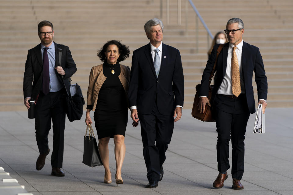 FILE - U.S. Rep. Jeff Fortenberry, R-Neb., center right, and wife, Celeste, arrive at the federal courthouse for his trial in Los Angeles, Wednesday, March 16, 2022. Fortenberry was convicted Thursday, March 24, 2022, of charges that he lied to federal authorities about an illegal $30,000 contribution to his campaign from a foreign billionaire at a 2016 Los Angeles fundraiser.(AP Photo/Jae C. Hong, File)