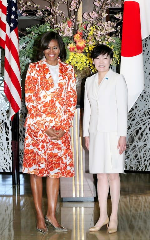Michelle Obama wearing Altuzarra - Credit: The Asahi Shimbun