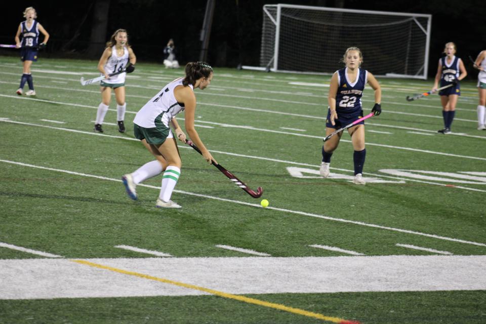 Madylin Breault of Quabbin approaches to defend Oakmont's Addie Collette. Quabbin and Oakmont played on Oct. 2, 2023 and finished with a 0-0 tie.