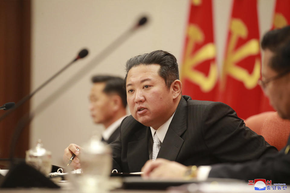 In this photo taken during Dec. 27 - Dec. 31, 2021 and provided on Saturday, Jan. 1, 2022 by the North Korean government, North Korean leader Kim Jong Un, center, attends a meeting of the Central Committee of the ruling Workers’ Party in Pyongyang, North Korea. Independent journalists were not given access to cover the event depicted in this image distributed by the North Korean government. The content of this image is as provided and cannot be independently verified. Korean language watermark on image as provided by source reads: "KCNA" which is the abbreviation for Korean Central News Agency. (Korean Central News Agency/Korea News Service via AP)