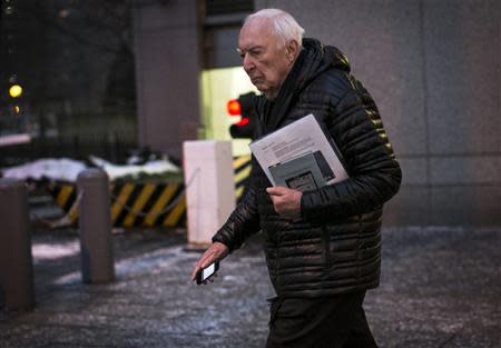 Contemporary artist Jasper Johns exits the Manhattan Federal Courthouse in New York January 23, 2014. REUTERS/Brendan McDermid
