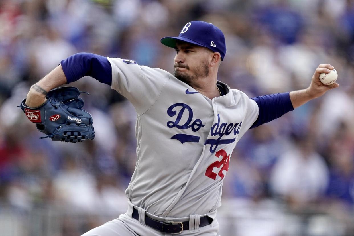 Dodgers starting pitcher Andrew Heaney throws against the Kansas City Royals on Saturday.