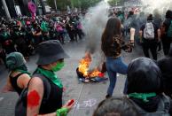 Abortion rights campaigners clash with police in Mexico City